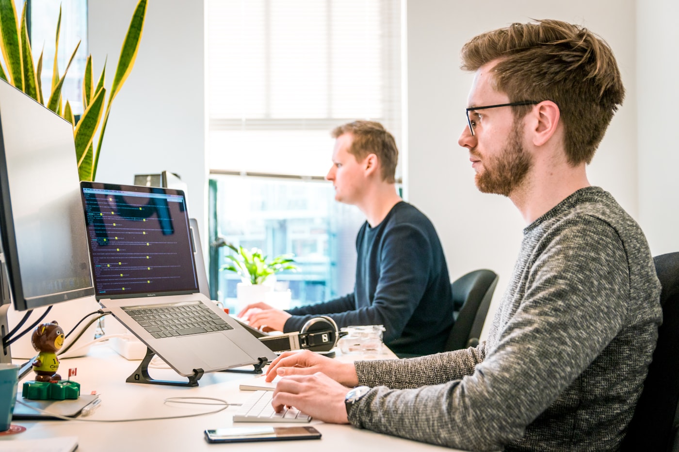 A SaaS support team working alongside an AI agent grounded in their docs